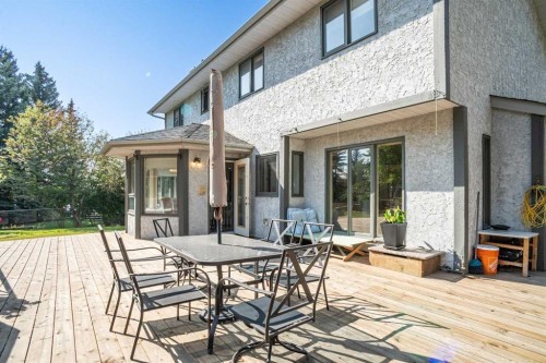 307 Woodhaven Bay Sw, Calgary, AB - Outdoor With Deck Patio Veranda With Exterior