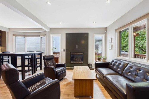 224 10A Street Nw, Calgary, AB - Indoor Photo Showing Living Room With Fireplace