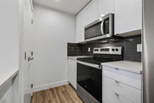 214 Seton Passage Se, Calgary, AB - Indoor Photo Showing Kitchen