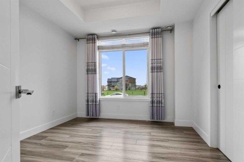 214 Seton Passage Se, Calgary, AB - Indoor Photo Showing Other Room