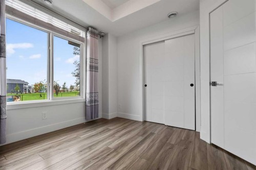 214 Seton Passage Se, Calgary, AB - Indoor Photo Showing Other Room