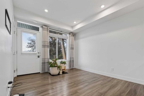 214 Seton Passage Se, Calgary, AB - Indoor Photo Showing Other Room