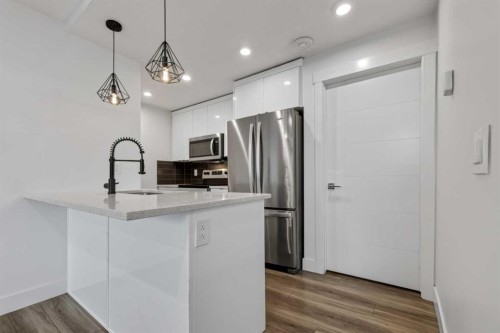 214 Seton Passage Se, Calgary, AB - Indoor Photo Showing Kitchen With Stainless Steel Kitchen With Upgraded Kitchen