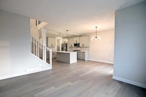 12 Topaz Place, Cochrane, AB - Indoor Photo Showing Kitchen