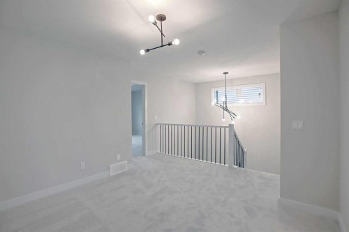 12 Topaz Place, Cochrane, AB - Indoor Photo Showing Other Room