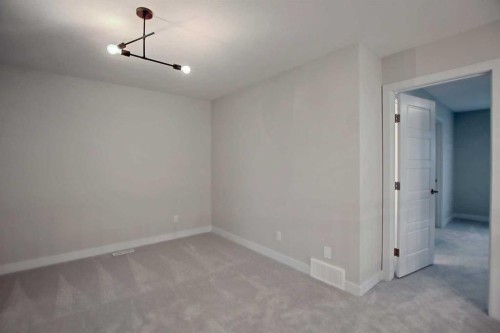 12 Topaz Place, Cochrane, AB - Indoor Photo Showing Other Room