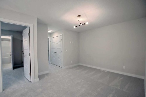 12 Topaz Place, Cochrane, AB - Indoor Photo Showing Other Room