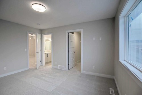 12 Topaz Place, Cochrane, AB - Indoor Photo Showing Other Room