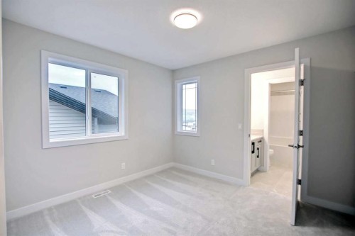 12 Topaz Place, Cochrane, AB - Indoor Photo Showing Other Room