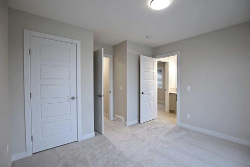 12 Topaz Place, Cochrane, AB - Indoor Photo Showing Other Room