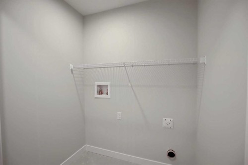 12 Topaz Place, Cochrane, AB - Indoor With Storage