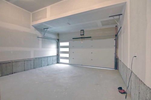 12 Topaz Place, Cochrane, AB - Indoor Photo Showing Garage