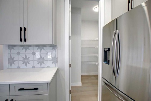 12 Topaz Place, Cochrane, AB - Indoor Photo Showing Other Room