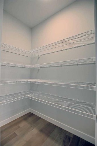 12 Topaz Place, Cochrane, AB - Indoor With Storage