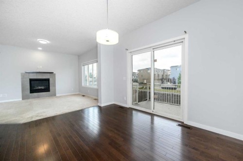 101 Savanna Close Ne, Calgary, AB - Indoor Photo Showing Living Room With Fireplace