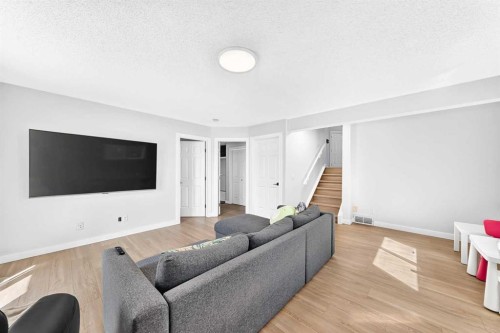 315 Appleglen Place Se, Calgary, AB - Indoor Photo Showing Living Room