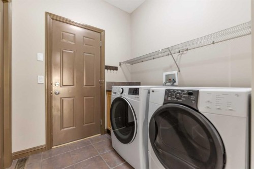 49 Panamount Rise Nw, Calgary, AB - Indoor Photo Showing Laundry Room