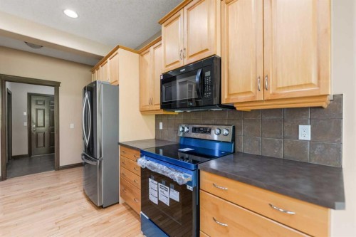 49 Panamount Rise Nw, Calgary, AB - Indoor Photo Showing Kitchen With Stainless Steel Kitchen