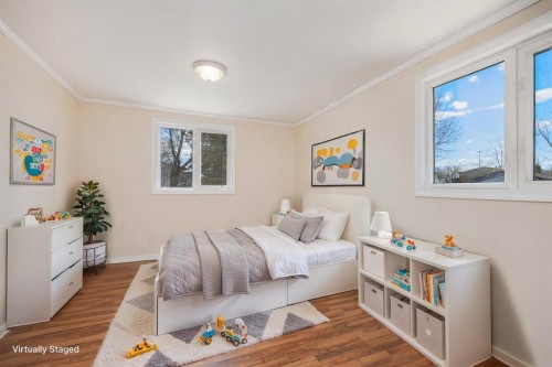 240 Big Hill Circle Se, Airdrie, AB - Indoor Photo Showing Bedroom