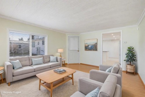 240 Big Hill Circle Se, Airdrie, AB - Indoor Photo Showing Living Room
