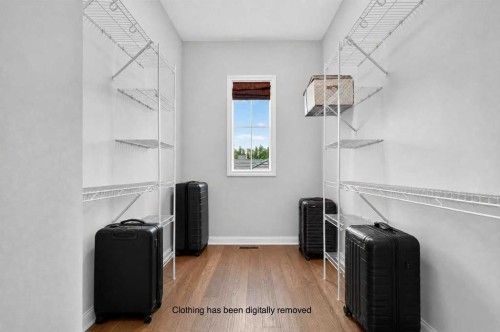 8 Spring Valley Lane Sw, Calgary, AB - Indoor With Storage