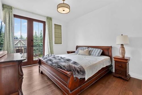 8 Spring Valley Lane Sw, Calgary, AB - Indoor Photo Showing Bedroom