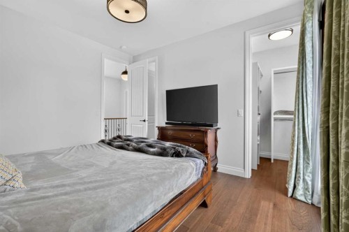 8 Spring Valley Lane Sw, Calgary, AB - Indoor Photo Showing Bedroom