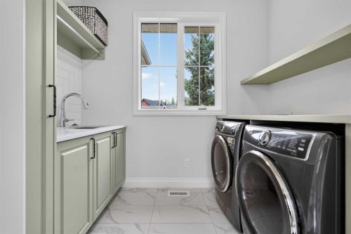 8 Spring Valley Lane Sw, Calgary, AB - Indoor Photo Showing Laundry Room