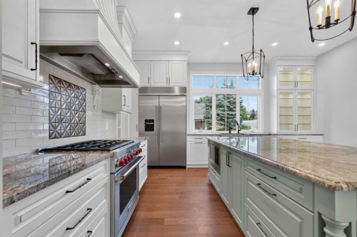8 Spring Valley Lane Sw, Calgary, AB - Indoor Photo Showing Kitchen With Upgraded Kitchen