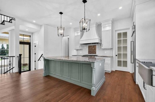 8 Spring Valley Lane Sw, Calgary, AB - Indoor Photo Showing Kitchen With Upgraded Kitchen