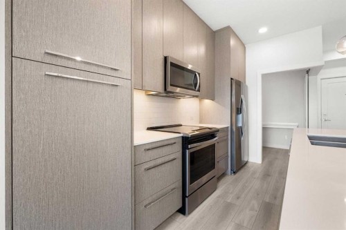 1425-76 Cornerstone Passage Ne, Calgary, AB - Indoor Photo Showing Kitchen With Stainless Steel Kitchen With Double Sink With Upgraded Kitchen