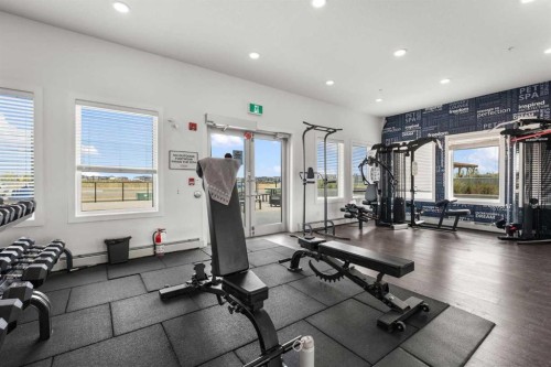1425-76 Cornerstone Passage Ne, Calgary, AB - Indoor Photo Showing Gym Room