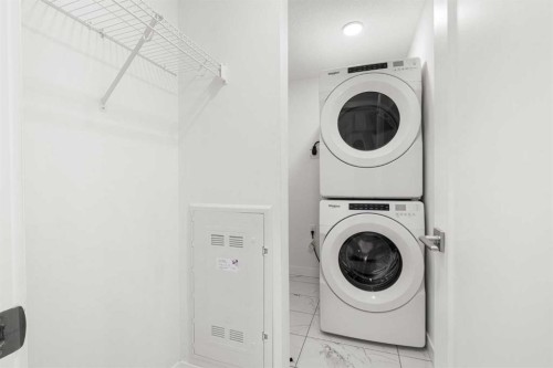 1425-76 Cornerstone Passage Ne, Calgary, AB - Indoor Photo Showing Laundry Room