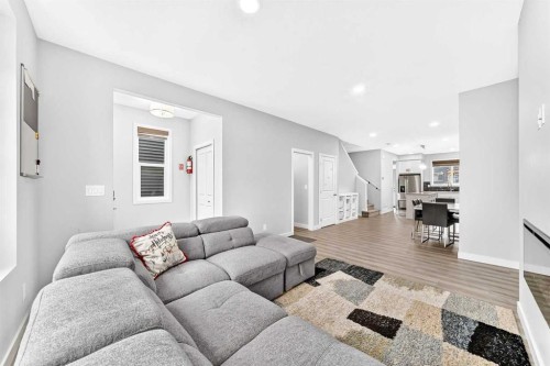 164 Langwell Common Se, Airdrie, AB - Indoor Photo Showing Living Room