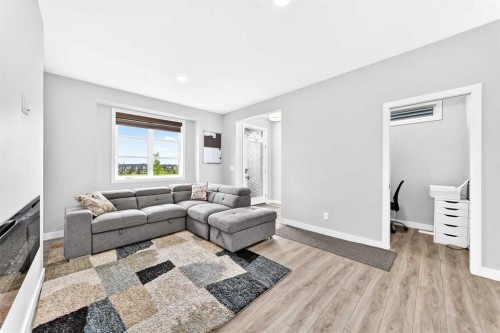 164 Langwell Common Se, Airdrie, AB - Indoor Photo Showing Living Room
