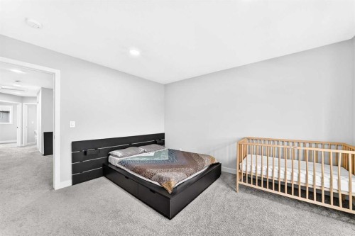 164 Langwell Common Se, Airdrie, AB - Indoor Photo Showing Bedroom