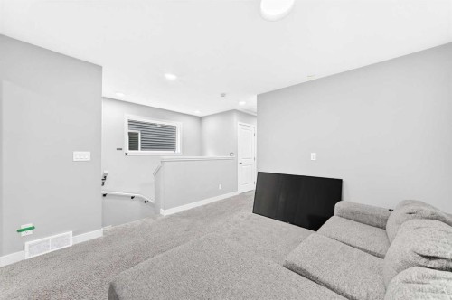 164 Langwell Common Se, Airdrie, AB - Indoor Photo Showing Other Room
