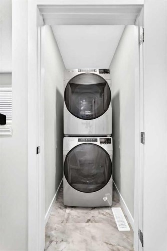 164 Langwell Common Se, Airdrie, AB - Indoor Photo Showing Laundry Room