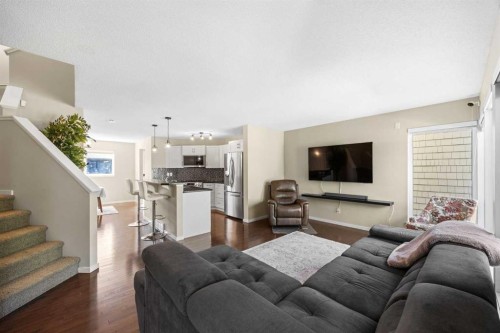 140 Walden Gate Se, Calgary, AB - Indoor Photo Showing Living Room