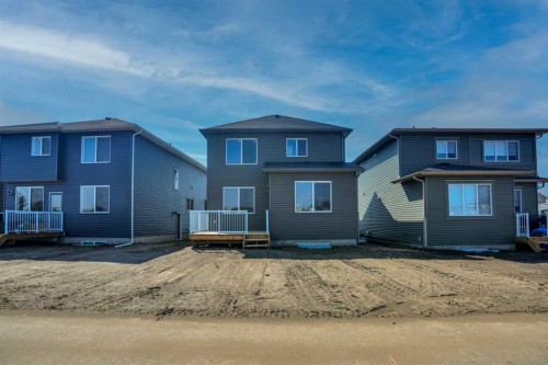 534 Ranch Green, Strathmore, AB - Outdoor With Deck Patio Veranda With Facade