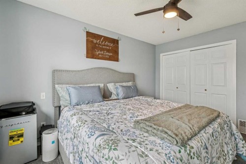 116 Quigley Close, Cochrane, AB - Indoor Photo Showing Bedroom