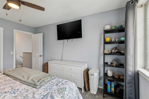 116 Quigley Close, Cochrane, AB - Indoor Photo Showing Bedroom