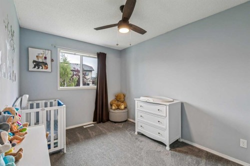 116 Quigley Close, Cochrane, AB - Indoor Photo Showing Bedroom