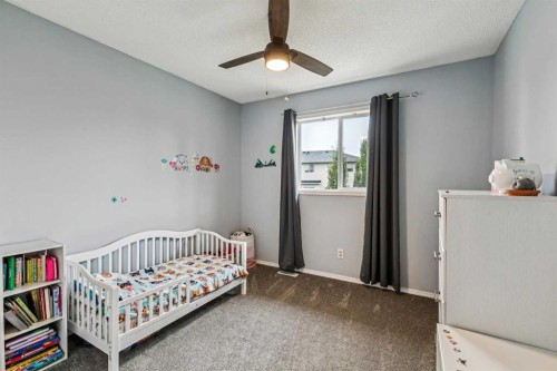 116 Quigley Close, Cochrane, AB - Indoor Photo Showing Bedroom