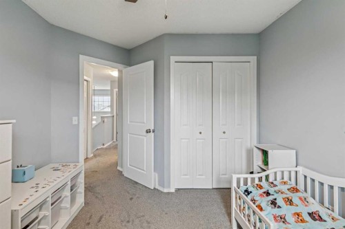 116 Quigley Close, Cochrane, AB - Indoor Photo Showing Bedroom