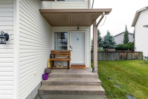 116 Quigley Close, Cochrane, AB - Outdoor With Exterior
