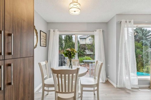 116 Quigley Close, Cochrane, AB - Indoor Photo Showing Dining Room
