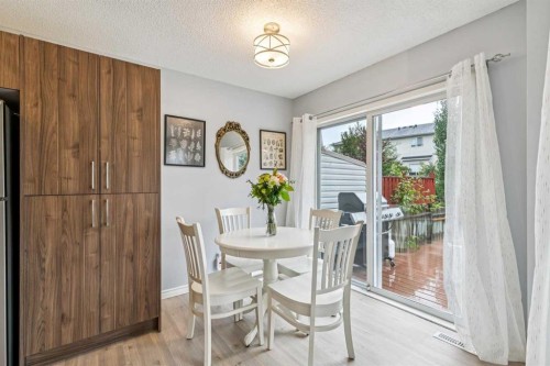 116 Quigley Close, Cochrane, AB - Indoor Photo Showing Dining Room