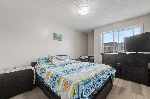 2430-700 Willowbrook Road Nw, Airdrie, AB - Indoor Photo Showing Bedroom