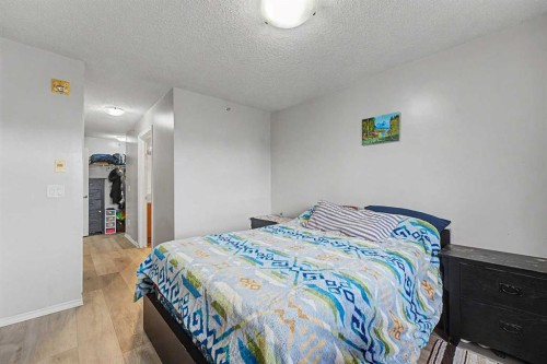 2430-700 Willowbrook Road Nw, Airdrie, AB - Indoor Photo Showing Bedroom